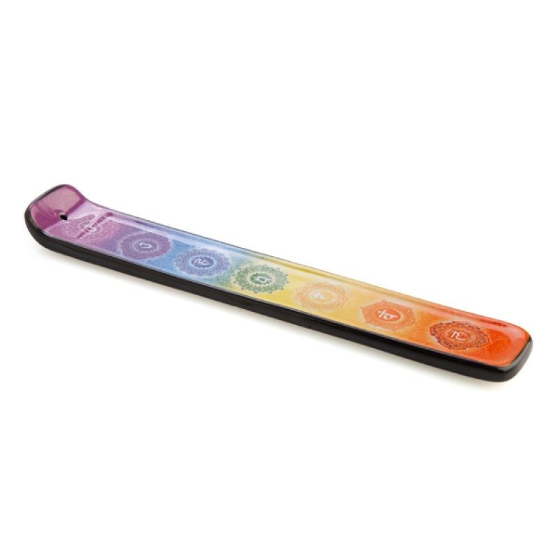 Bright rainbow ceramic chakra incense burner with seven colored chakra symbols for incense sticks