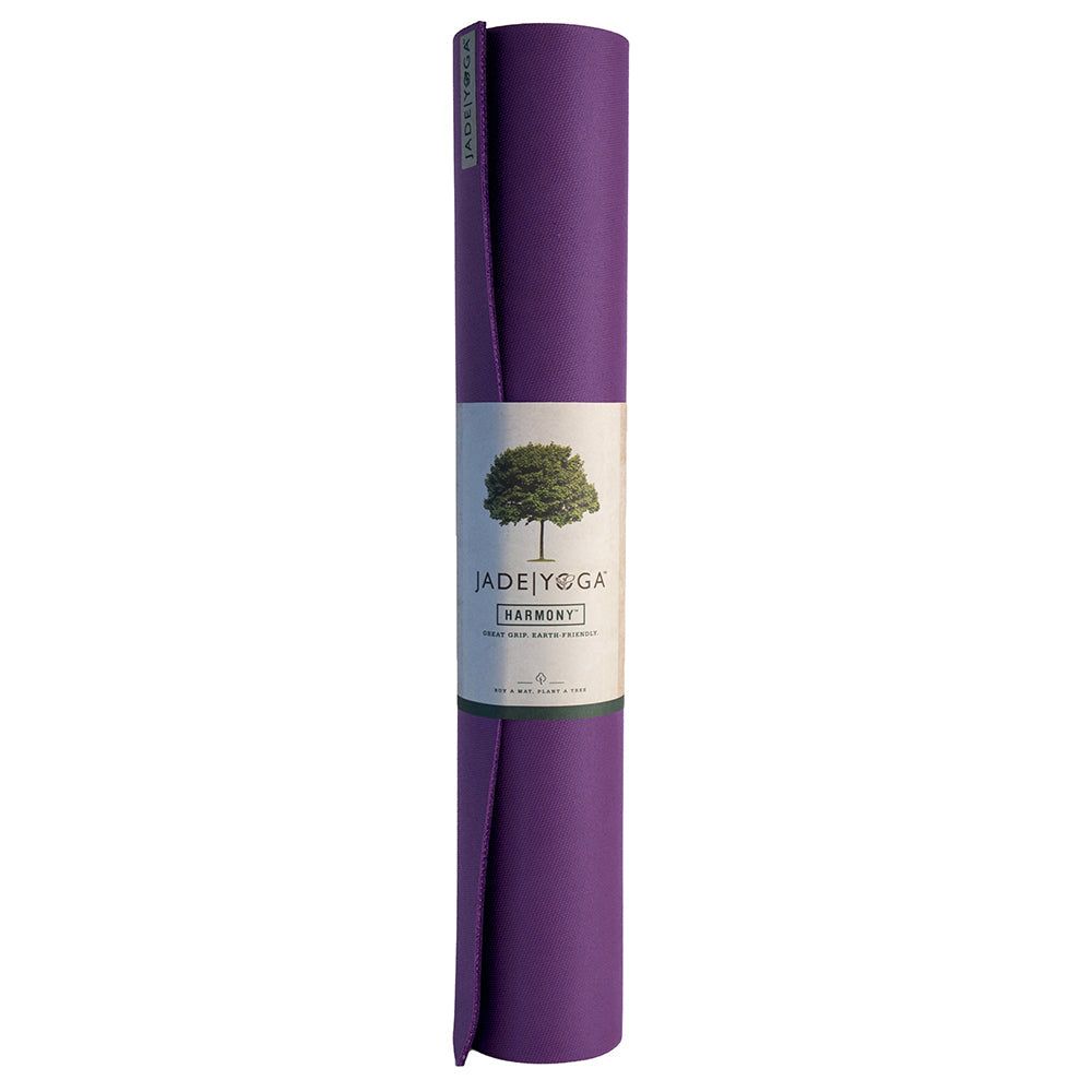 Rolled purple Jade Yoga Harmony Mat made of natural rubber with firm grip and eco-friendly design