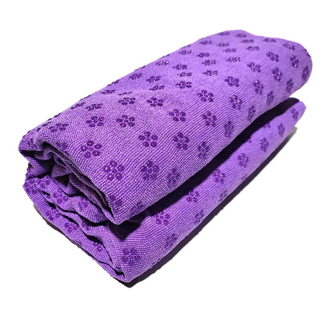 Purple Plum Blossom absorbent, thick, non-slip yoga towel mat rolled up on white background