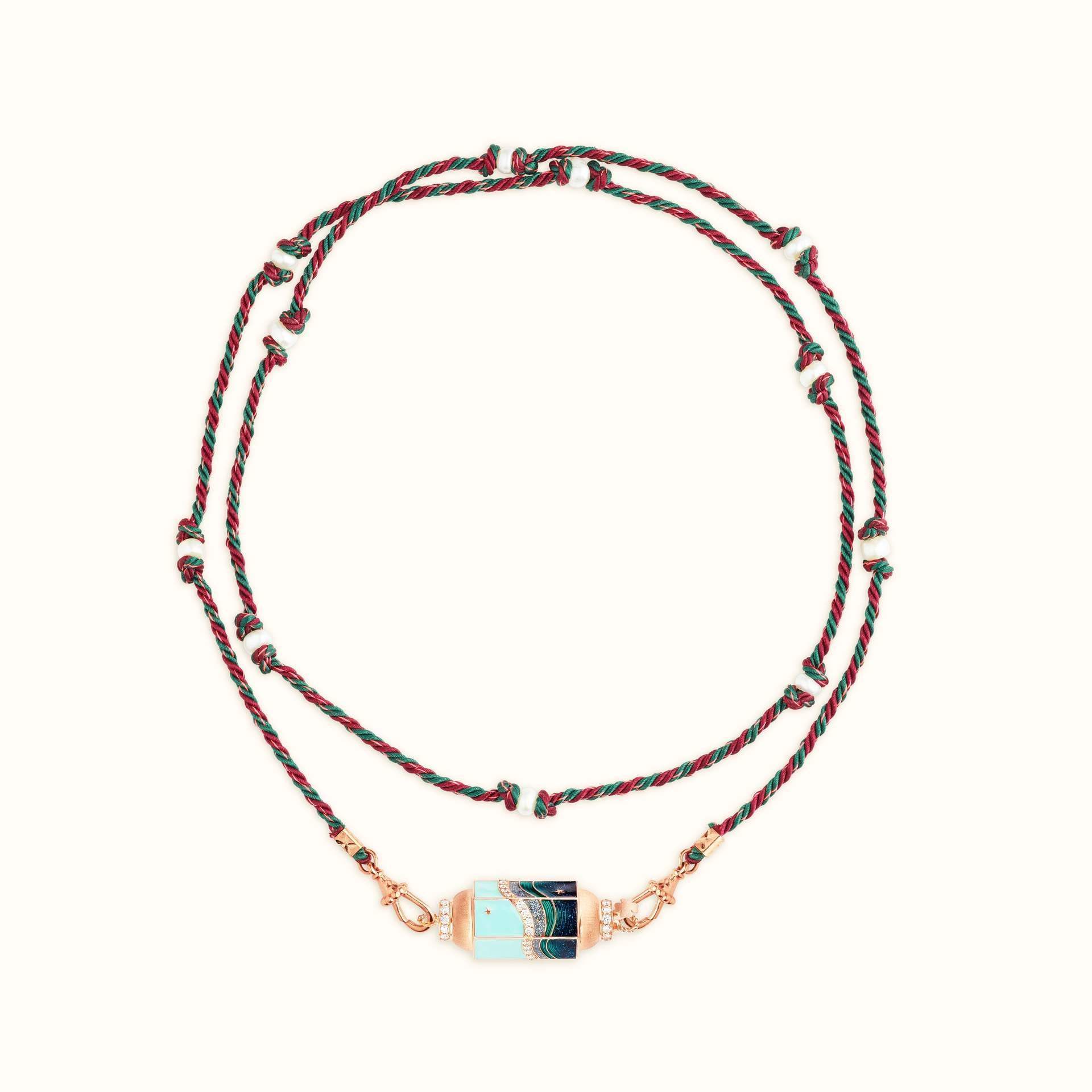 Mystical Tarot Charm Necklace with gold-plated boho pendant featuring ocean pattern and celestial motifs on adjustable cord chain