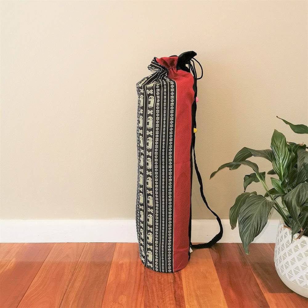 Thai Boho yoga mat carry bag in red with black and white tribal patterns, handmade cotton fabric with drawstring closure