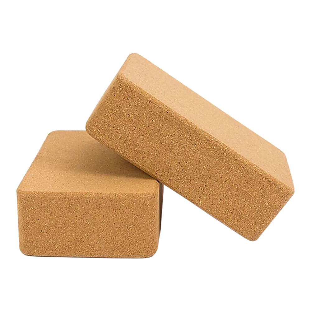 Two natural cork yoga blocks with smooth edges and non-slip surface for exercise and balance training