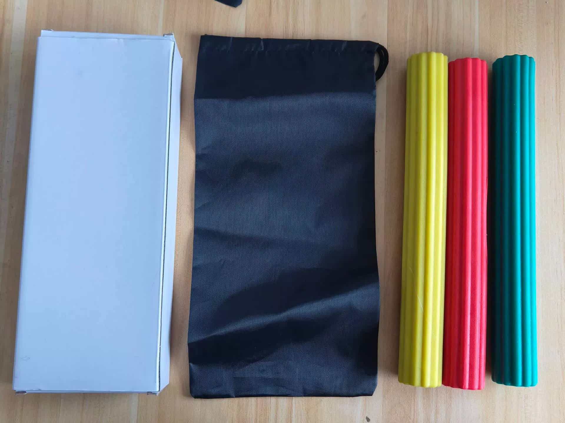 Multifunctional resistance bar set with three colorful grip strength and muscle recovery bars and a black storage bag.