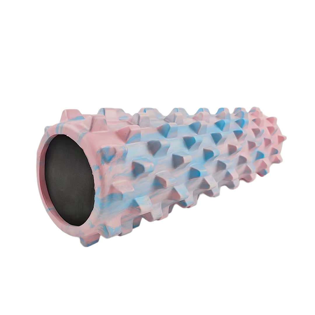 Colorful solid yoga foam roller with wolf tooth texture for muscle massage and relaxation