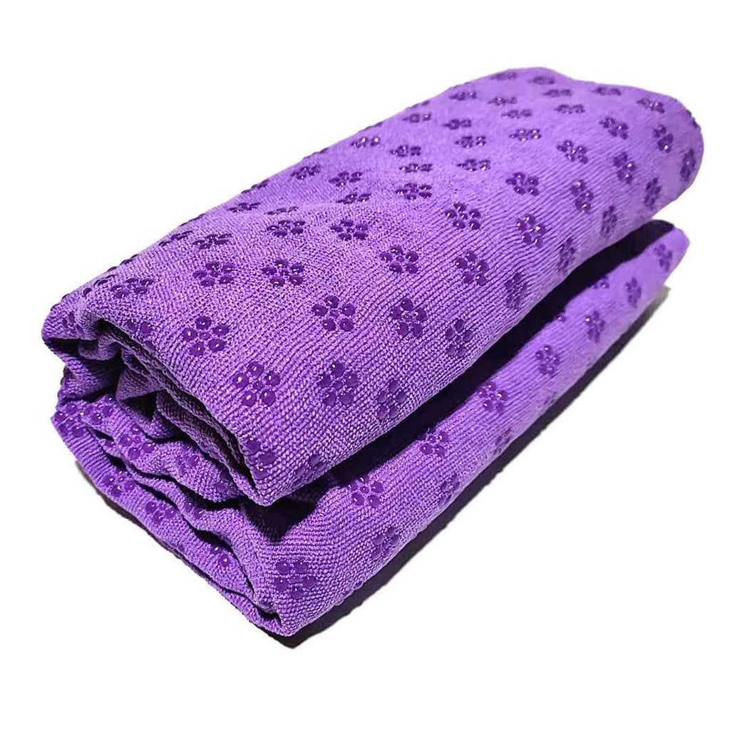 Purple Plum Blossom absorbent, thick, non-slip yoga towel mat rolled up on white background