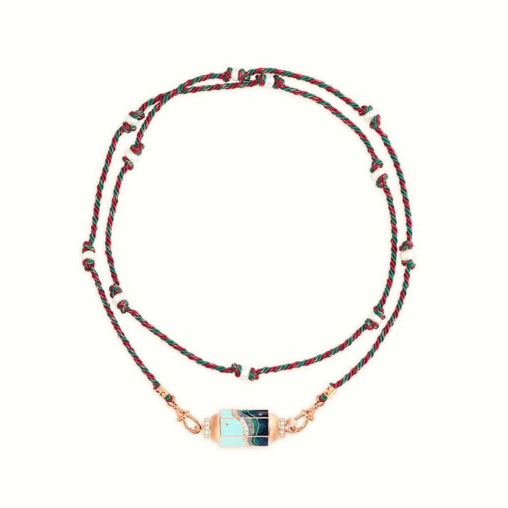 Mystical Tarot Charm Necklace with gold-plated boho pendant featuring ocean pattern and celestial motifs on adjustable cord chain