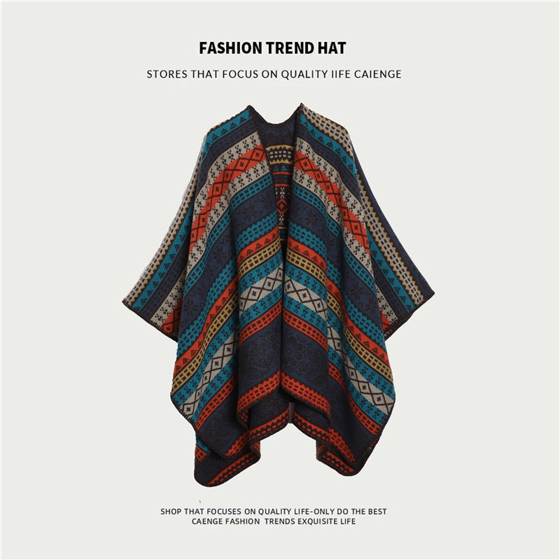 Orange and navy ethnic boho shawl with intricate floral patterns and split cape design.