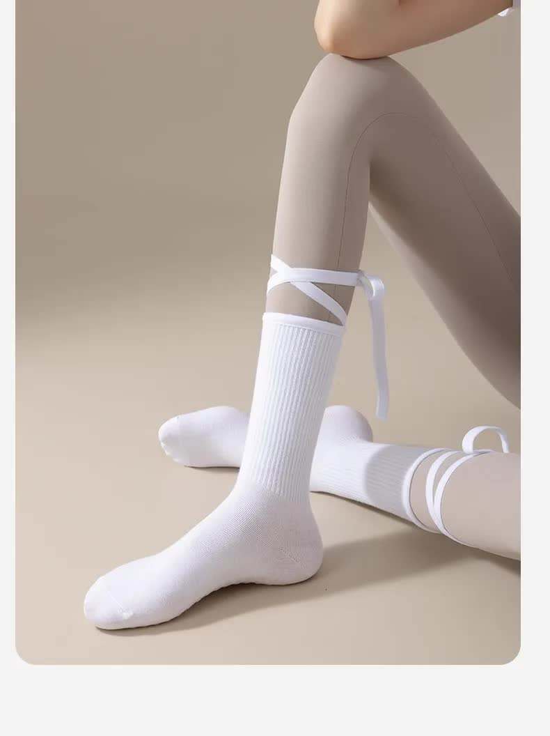 White non-slip yoga socks with cross straps, lightweight cotton for women’s Pilates and dance workouts