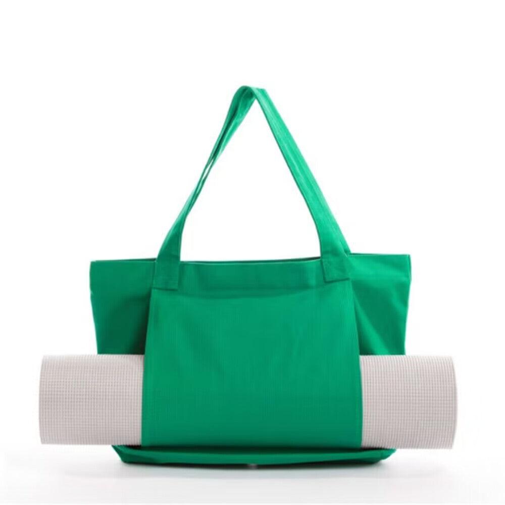 Green canvas yoga mat tote bag with side pocket and shoulder straps