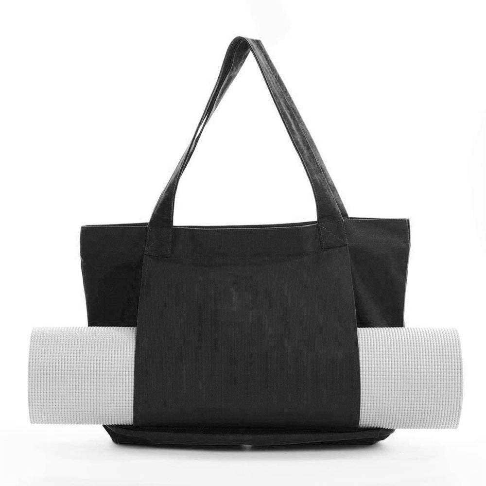 Black canvas yoga mat tote bag with side pocket for carrying rolled yoga mat, durable shoulder straps, and spacious main compartment for workout essentials.