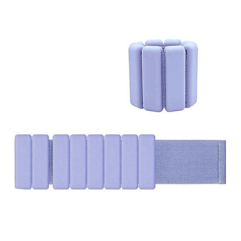 Purple premium adjustable silicone wrist and ankle weights with removable steel blocks and Velcro strap, waterproof and sweatproof for fitness workouts