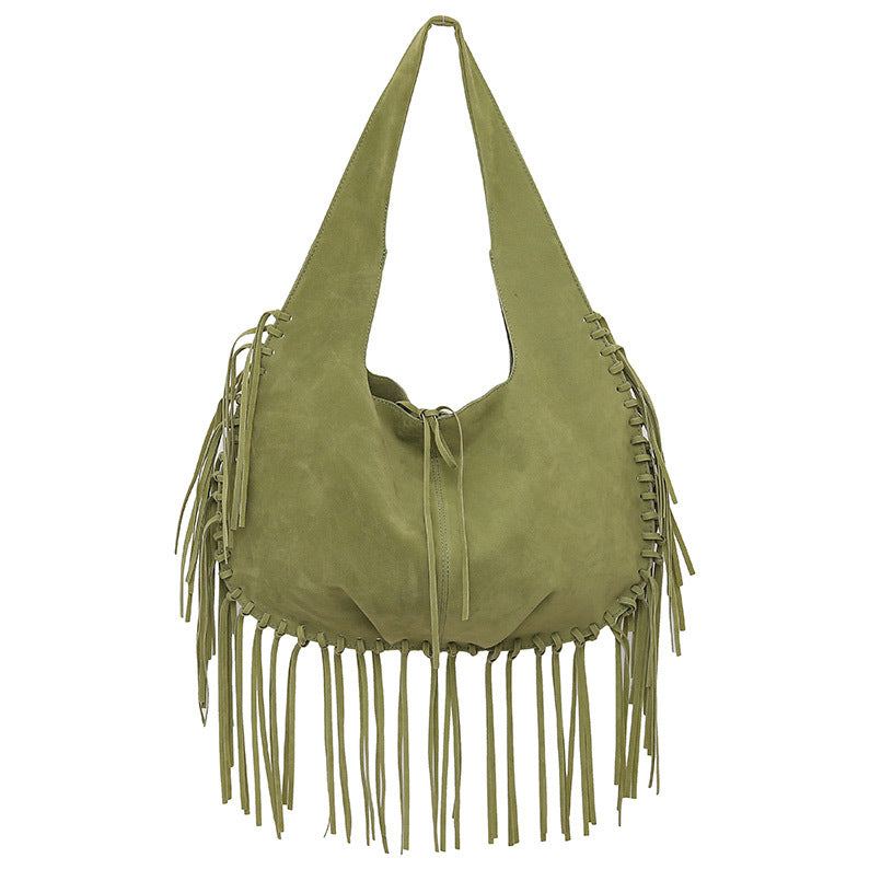 Green boho chic faux suede fringed hobo shoulder bag with laced edges and spacious design